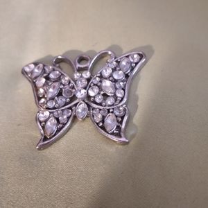 Beautiful brand new silver adorned butterfly pendant. Never worn, rare piece